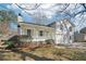 Charming two-story home with a covered front porch and well-maintained lawn and driveway at 55 Sunset Rd, Mcdonough, GA 30253
