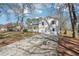 Charming two-story home with a covered front porch and well-maintained lawn and driveway at 55 Sunset Rd, Mcdonough, GA 30253