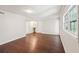 Spacious room with hardwood floors, and view of bonus nook and natural light at 55 Sunset Rd, Mcdonough, GA 30253