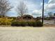 Attractive community entrance sign surrounded by well-maintained landscaping, creating a welcoming ambiance at 3318 Sardis Bend Dr, Buford, GA 30519