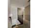 Upstairs hallway with carpet flooring and access to rooms, creates a seamless flow within the home's layout at 3318 Sardis Bend Dr, Buford, GA 30519