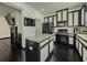 Modern kitchen featuring stainless steel appliances, granite countertops, and a stylish kitchen island at 3318 Sardis Bend Dr, Buford, GA 30519