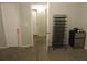 Bedroom featuring neutral paint and carpet with ensuite bath access for a comfortable personal space at 402 Pine Tree Trl, Atlanta, GA 30349