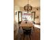 Bright dining area featuring a decorative light fixture and access to an outdoor living space at 793 Round Tree Ct, Lawrenceville, GA 30045