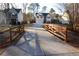 Long driveway leading up to a charming home, framed by a decorative wooden fence at 793 Round Tree Ct, Lawrenceville, GA 30045