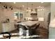 The gourmet kitchen showcases a large island, custom cabinetry, quartz countertops, and modern appliances at 793 Round Tree Ct, Lawrenceville, GA 30045