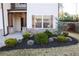 Close-up of the home's landscaping, featuring lush greenery, mulch and a neat arrangement at 793 Round Tree Ct, Lawrenceville, GA 30045
