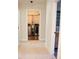 Hallway view of a laundry room featuring modern washer and dryer at 793 Round Tree Ct, Lawrenceville, GA 30045