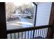 Outdoor view from a small porch overlooking the street and surrounding homes at 793 Round Tree Ct, Lawrenceville, GA 30045