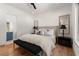 Comfortable bedroom with a neutral color palette and contemporary furnishings at 4100 Thunderbird Dr, Marietta, GA 30067