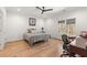 Comfortable bedroom with a ceiling fan and large window offering a peaceful and well-lit space at 4100 Thunderbird Dr, Marietta, GA 30067