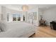 Cozy bedroom filled with natural light and showcasing art and a window seat at 4100 Thunderbird Dr, Marietta, GA 30067