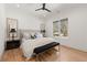 Charming bedroom featuring hardwood floors, neutral tones and large window at 4100 Thunderbird Dr, Marietta, GA 30067