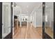 Elegant foyer with gleaming hardwood floors, staircase, and views into the living spaces, offering a grand entrance at 4100 Thunderbird Dr, Marietta, GA 30067