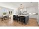 Contemporary kitchen with a center island, barstool seating, stainless steel appliances, and white cabinets at 4100 Thunderbird Dr, Marietta, GA 30067