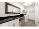 Well-equipped laundry room offers storage, counter space, sink, and modern washer and dryer units at 4100 Thunderbird Dr, Marietta, GA 30067