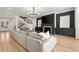 Comfortable living room featuring hardwood floors, a modern fireplace, and stylish decor at 4100 Thunderbird Dr, Marietta, GA 30067