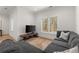 Bright living room features a large window and comfortable seating for relaxing and enjoying natural light at 4100 Thunderbird Dr, Marietta, GA 30067