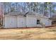 Beautiful house with a well-kept lawn and attractive exterior design at 6010 Canaan Woods Dr, South Fulton, GA 30331