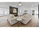 Cozy living room featuring stylish furniture, fireplace, and an open layout at 6010 Canaan Woods Dr, South Fulton, GA 30331