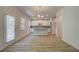 Bright kitchen features stainless appliances, granite countertops, white cabinets, and an island with barstool seating at 793 River Gardens Dr, Atlanta, GA 30354