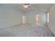 Spacious main bedroom with neutral carpet and access to closet and bathroom at 793 River Gardens Dr, Atlanta, GA 30354