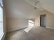 Bedroom with a vaulted ceiling and a ceiling fan for comfort at 8008 Revere Dr, Mcdonough, GA 30252