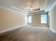 Spacious bedroom featuring carpet flooring, neutral paint, and abundant natural light at 8008 Revere Dr, Mcdonough, GA 30252