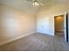 Bedroom featuring a vaulted ceiling, ceiling fan, and access door at 8008 Revere Dr, Mcdonough, GA 30252