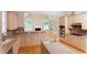 Spacious kitchen featuring wood cabinets, a center island, and open flow to the living area at 8008 Revere Dr, Mcdonough, GA 30252