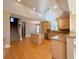 Bright kitchen with hardwood floors, central island, and modern appliances at 8008 Revere Dr, Mcdonough, GA 30252