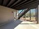 Covered patio with stairs leading to the yard at 8008 Revere Dr, Mcdonough, GA 30252