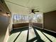 Cozy enclosed back porch with a screen door and room to relax at 8008 Revere Dr, Mcdonough, GA 30252