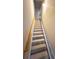 Stairway with carpeted steps and a handrail for safety at 8008 Revere Dr, Mcdonough, GA 30252