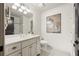 Clean bathroom featuring a white vanity, patterned floor tile, and decorative accents at 1100 Virginia Ne Ave, Atlanta, GA 30306
