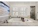 Spa-like bathroom featuring a large soaking tub and a separate glass shower at 1100 Virginia Ne Ave, Atlanta, GA 30306