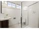 Bathroom with white tile and window at 1100 Virginia Ne Ave, Atlanta, GA 30306