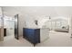 Open bedroom area featuring a built in dresser, neutral decor, and two twin beds at 1100 Virginia Ne Ave, Atlanta, GA 30306