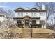 Charming two-story home with stone accents and manicured front yard at 1100 Virginia Ne Ave, Atlanta, GA 30306