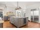 Well-equipped kitchen with hardwood floors, an island with seating, stainless steel appliances, and custom cabinetry at 1100 Virginia Ne Ave, Atlanta, GA 30306