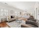 Bright main bedroom with a sitting area, neutral decor, and an en suite bathroom at 1100 Virginia Ne Ave, Atlanta, GA 30306