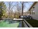 Beautiful backyard pool with an inviting outdoor seating area and lush landscaping at 1100 Virginia Ne Ave, Atlanta, GA 30306