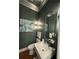 Elegant powder room features a modern mirror and stylish fixtures at 1100 Virginia Ne Ave, Atlanta, GA 30306