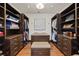 Spacious walk-in closet with custom shelving, drawers, and a central island at 1100 Virginia Ne Ave, Atlanta, GA 30306
