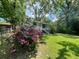 Well-maintained home exterior framed by trees at 1199 Warfield Nw St, Atlanta, GA 30318