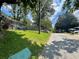 Quiet residential street lined with sidewalks and greenery at 1199 Warfield Nw St, Atlanta, GA 30318
