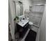 Well-lit bathroom with updated vanity, toilet, and shower, providing a clean and modern space at 2077 Brockett Rd, Tucker, GA 30084