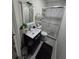 Cozy bathroom with glass door shower and modern white sink cabinet combo at 2077 Brockett Rd, Tucker, GA 30084