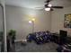 Neutral bedroom featuring twin beds, ceiling fan, and playful decor, perfect for a room at 2077 Brockett Rd, Tucker, GA 30084