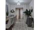 Dining room with statement lighting, stylish decor, and an abundance of light at 2077 Brockett Rd, Tucker, GA 30084